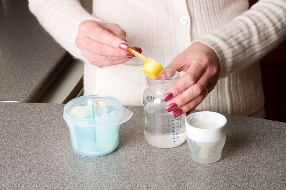 PHOTO: A mother makes a baby's powdered milk drink in this undated stock photo.