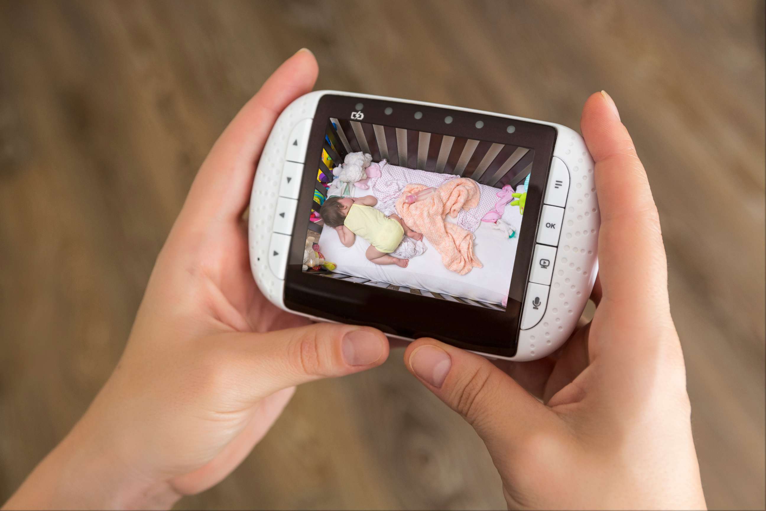 PHOTO: An undated stock photo show a person holding a baby monitor.