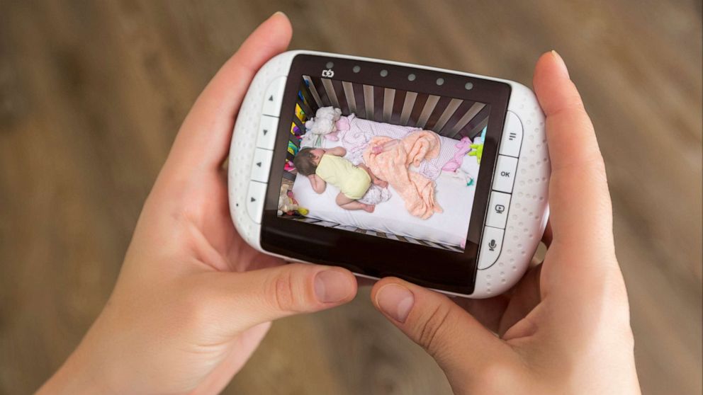 PHOTO: An undated stock photo show a person holding a baby monitor.