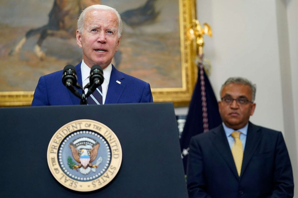 PHOTO: President Joe Biden, left, standing with White House COVID-19 Response Coordinator Ashish Jha, right, speaks about the newly approved COVID-19 vaccines for children under 5, June 21, 2022, at the White House.