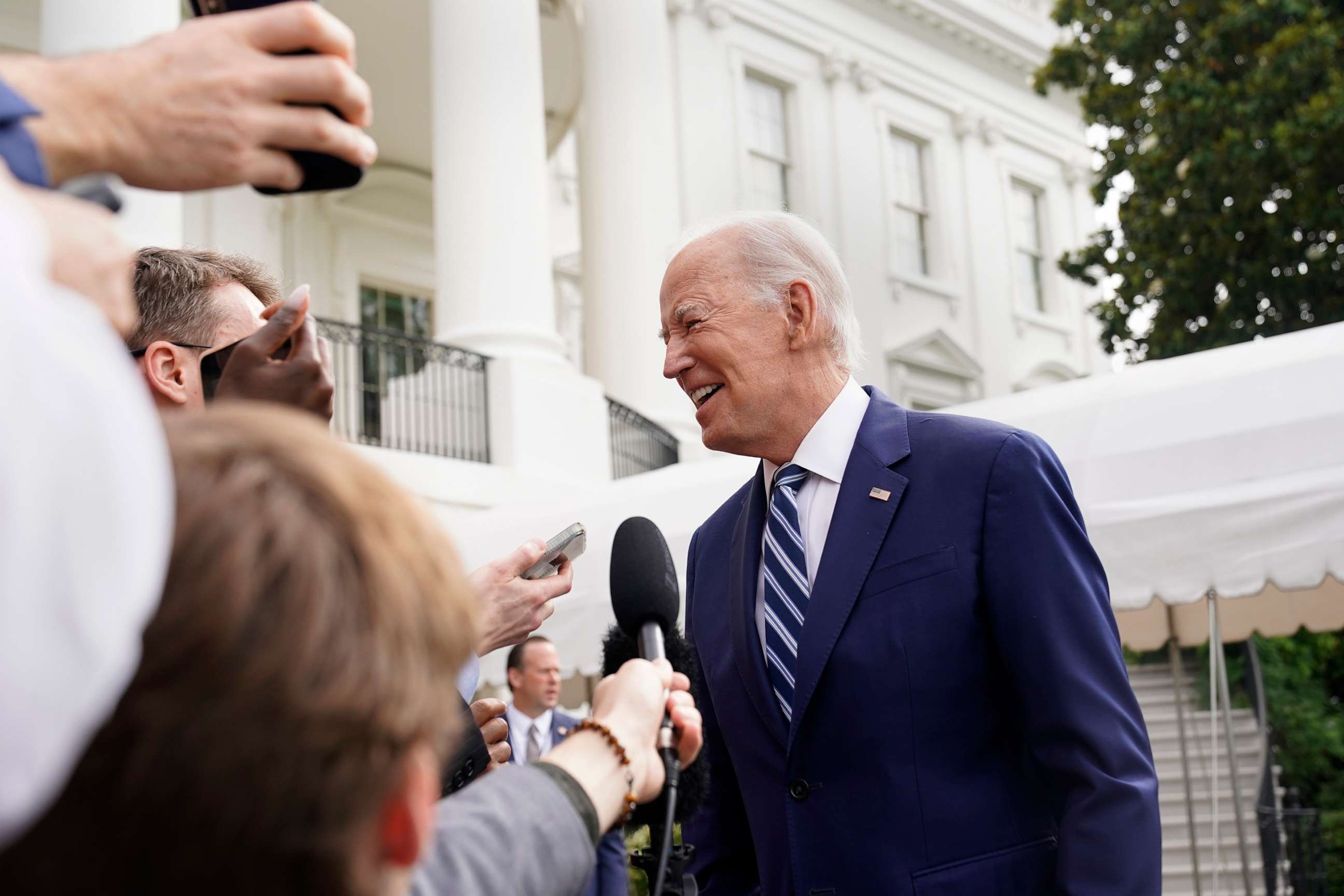 PHOTO: President Joe Biden speaks to reporters before boarding Marine One on the South Lawn of the White House, June 28, 2023.