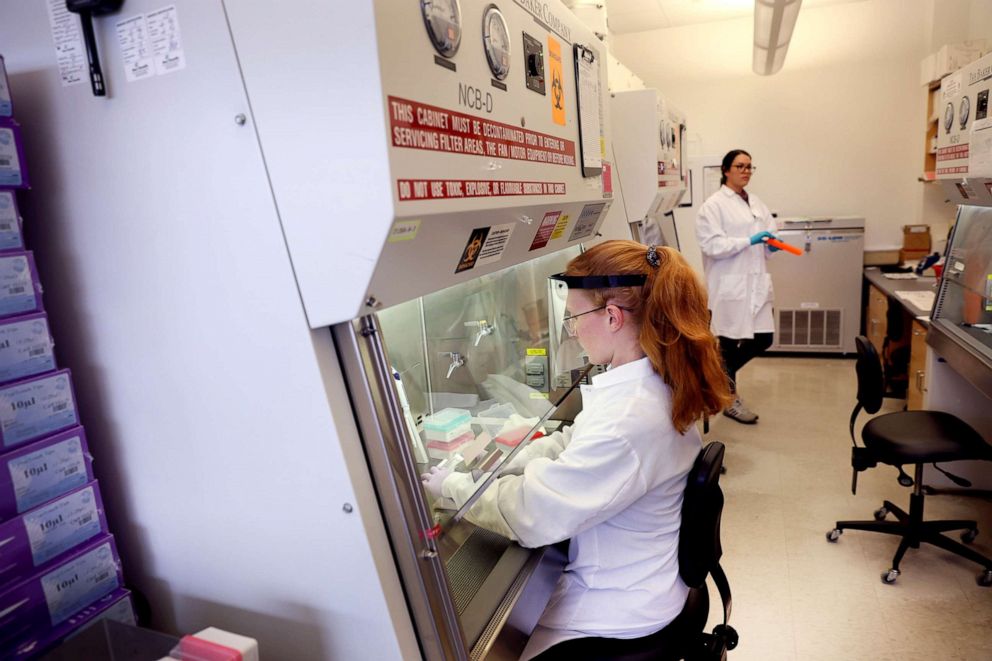 PHOTO: Microbiologist Anne Vandenburg-Carroll tests poultry samples for the presence of avian influenza, or bird flu, at the University of Wisconsin-Madison's Veterinary diagnostics lab in Madison, Wis., March 24, 2022. 