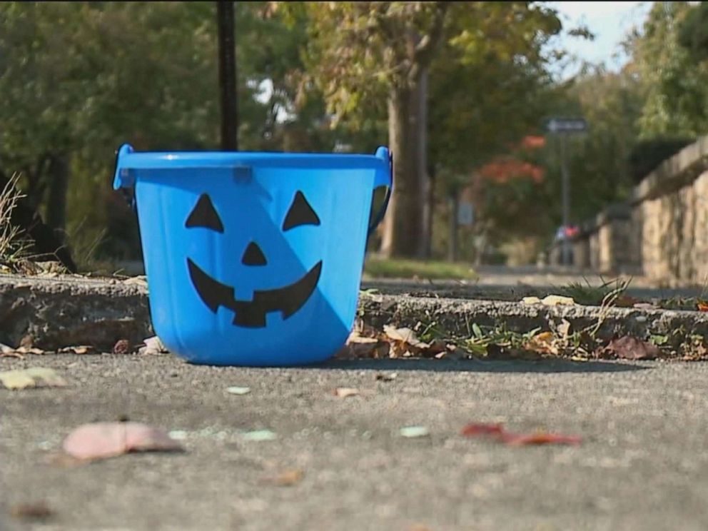 PHOTO: Blue buckets will be carried this Halloween for autism awareness.