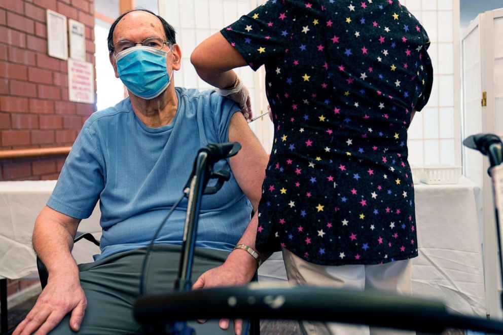 PHOTO: In this Sept. 27, 2021, file photo, Marvin Marcus, 79, a resident at the Hebrew Home at Riverdale, receives a COVID-19 booster shot in New Yor.