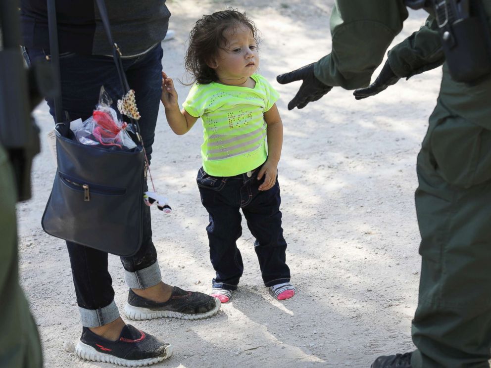 PHOTO: Border Patrol agents take Central American asylum seekers into custody on June 12, 2018 near McAllen, Texas.