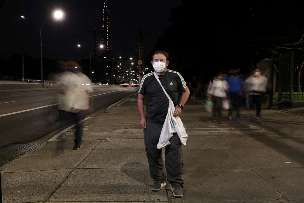 PHOTO: Sergio Aparecido Cleto, 46, a nurse and a volunteer in a COVID-19 vaccine trial for Sinovac, poses for a photograph in Sao Paulo, Brazil, Dec. 10, 2020.