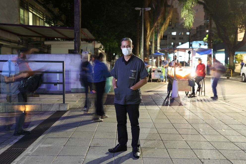 PHOTO: Keller de Martini, 55, a dental surgeon who volunteered in a COVID-19 vaccine trial for AstraZeneca, poses for a photograph in Sao Paulo, Brazil, Dec. 07, 2020.