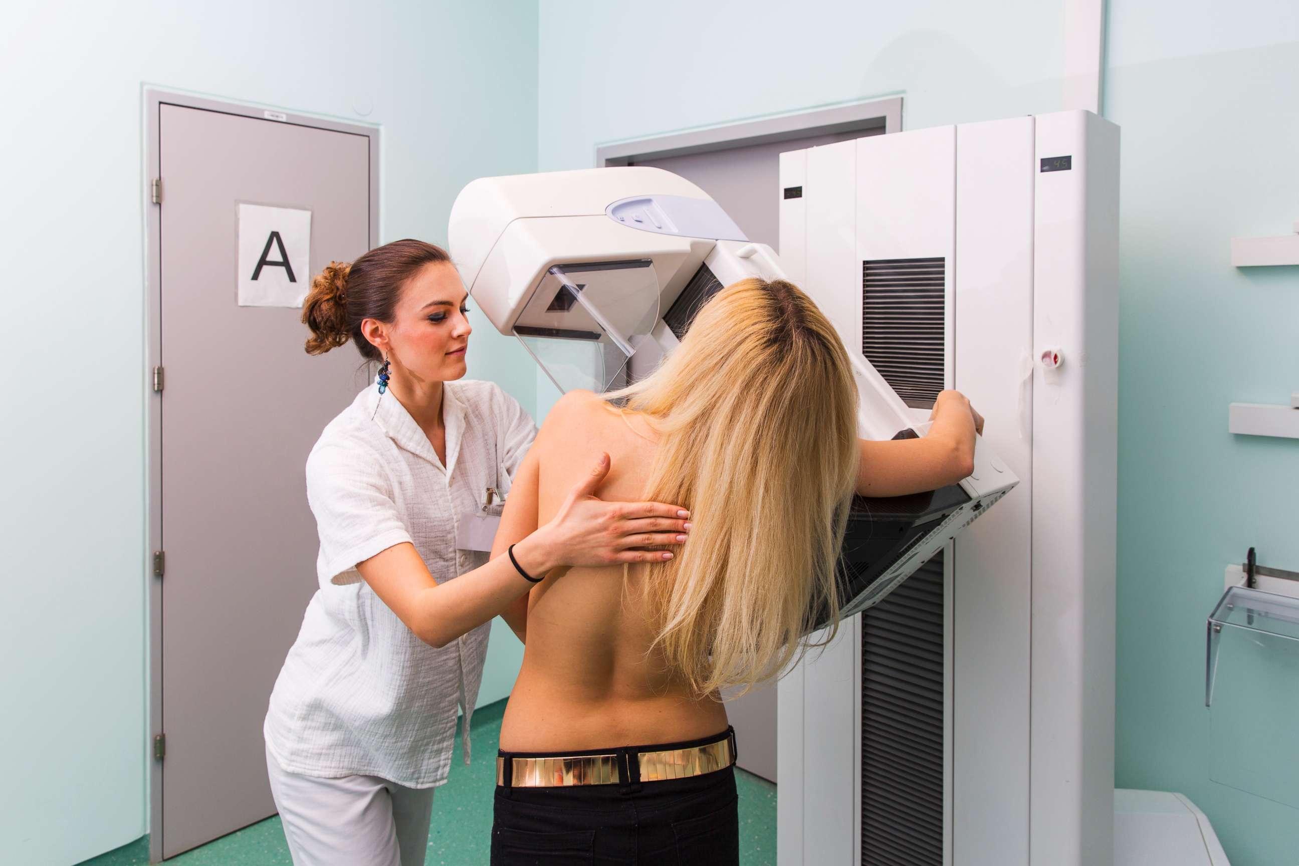 PHOTO: In this undated stock photo, a nurse with a young women having a mammography.