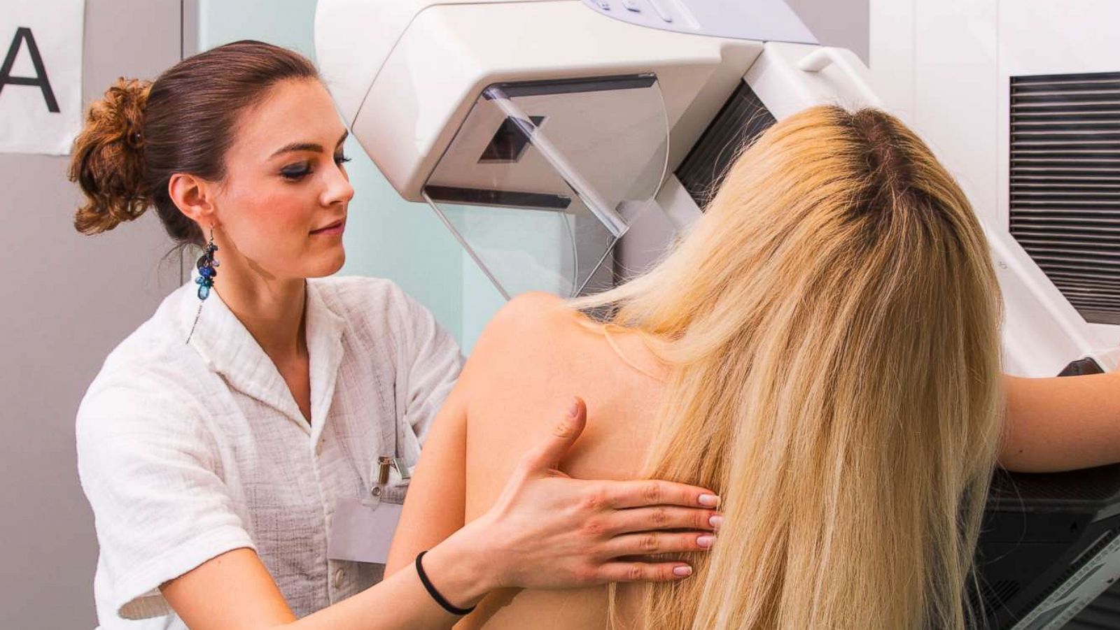 PHOTO: In this undated stock photo, a nurse with a young women having a mammography.