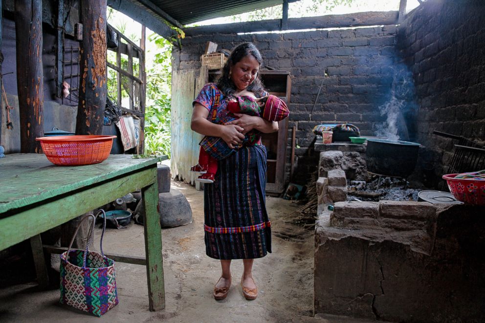 PHOTO: Sylvia poses while breastfeeding in Guatemala.