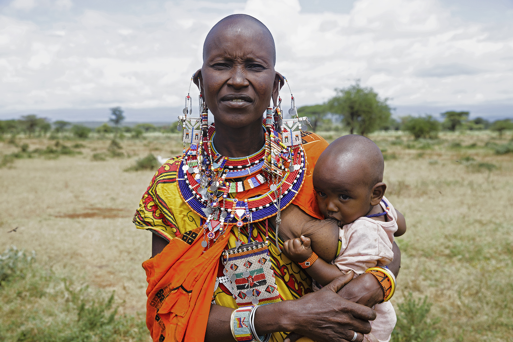 PHOTO: Loolei poses while breastfeeding in Kenya.