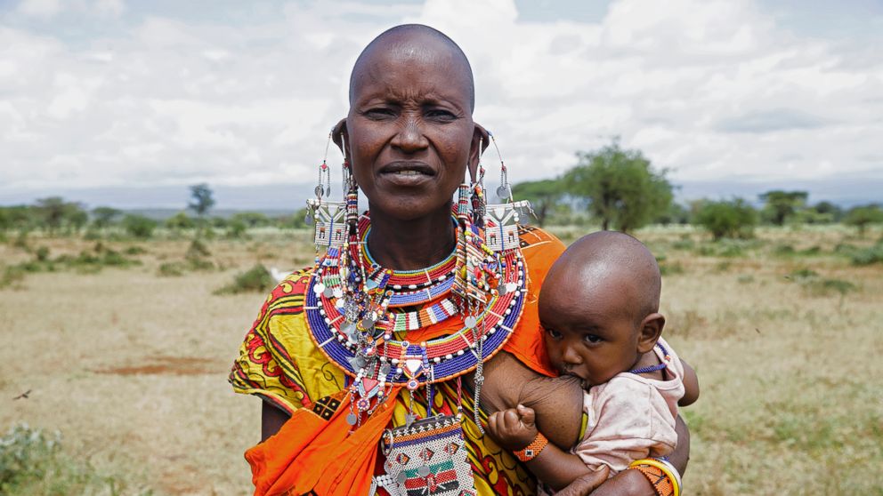 PHOTO: Loolei poses while breastfeeding in Kenya.