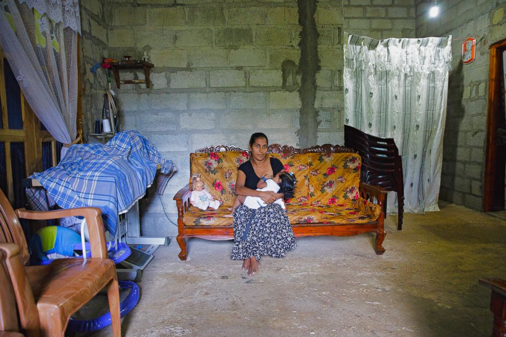 PHOTO: W.H.N  poses while breastfeeding in Sri Lanka.