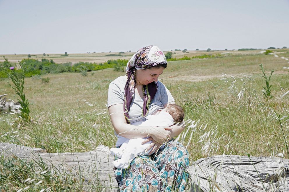 PHOTO: Gulush poses while breastfeeding in Turkey.