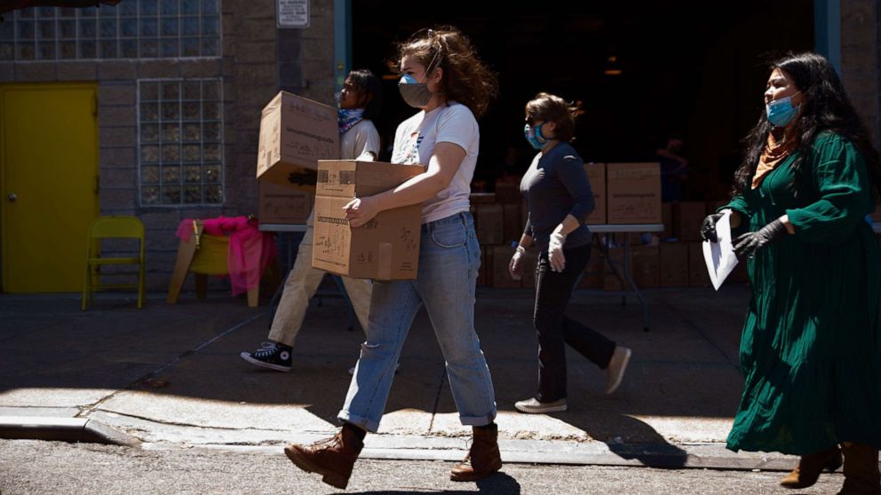 PHOTO: Volunteers with South Brooklyn Mutual Aid in New York City load boxed goods into cars where they will be distributed to families in need across the borough, May 2, 2020.