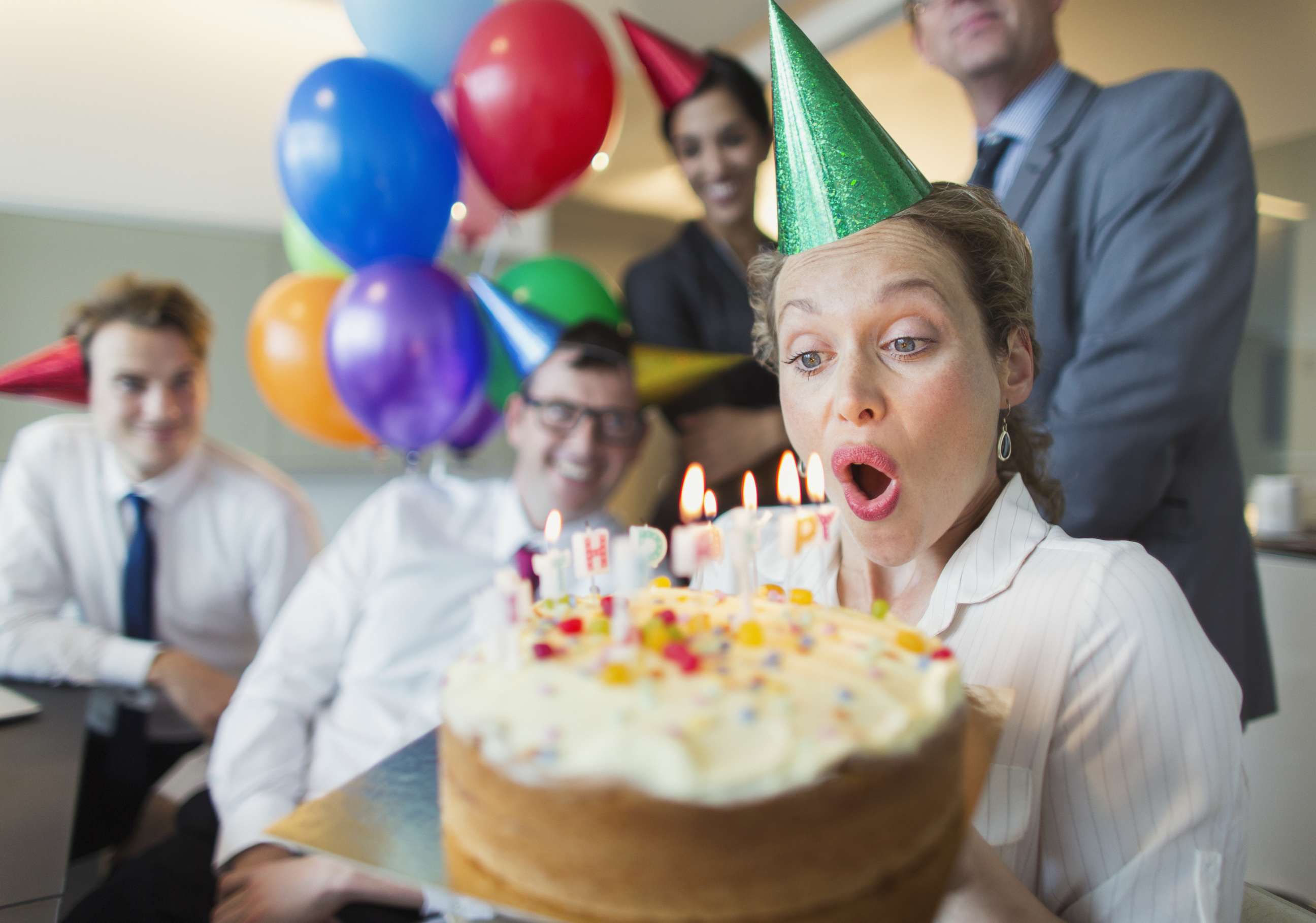 PHOTO: An undated stock photo of a woman blowing out candles. 
