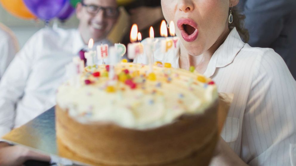 PHOTO: An undated stock photo of a woman blowing out candles. 
