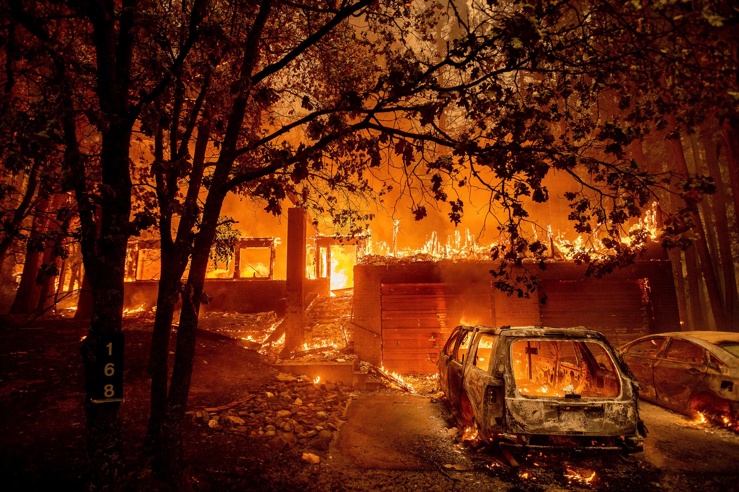 PHOTO: Flames consume a home as the Dixie Fire tears through the Indian Falls community in Plumas County, Calif., July 24, 2021.
