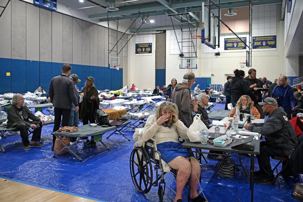 PHOTO: Evacuees from the Palisades fire are seen at an evacuation and shelter center at Westwood Recreation Center in Los Angeles, California, on January 8, 2025.