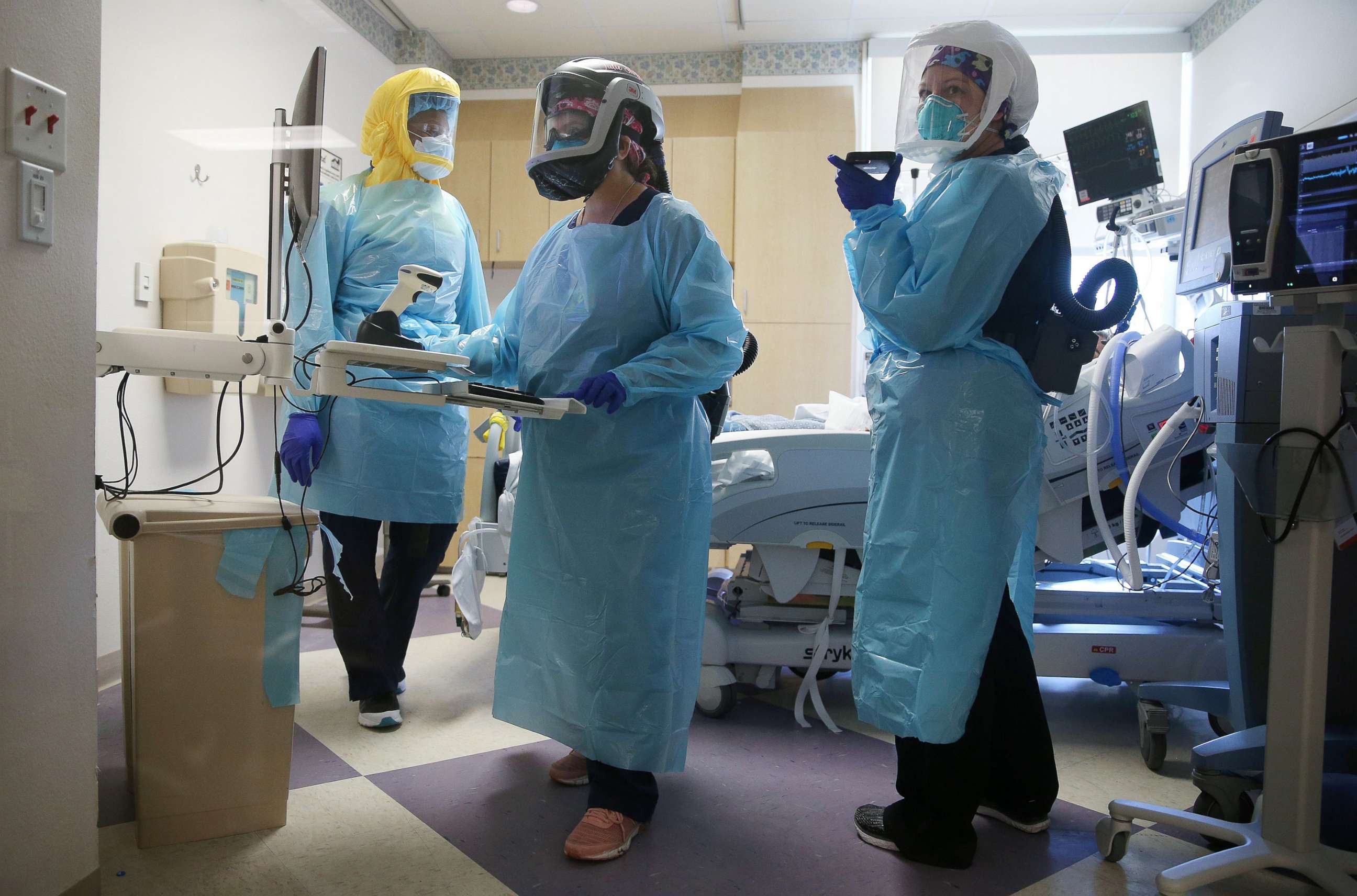PHOTO: In this July 21, 2020, file photo, clinicians care for a COVID-19 patient in the Intensive Care Unit at El Centro Regional Medical Center in hard-hit Imperial County in El Centro, Calif.