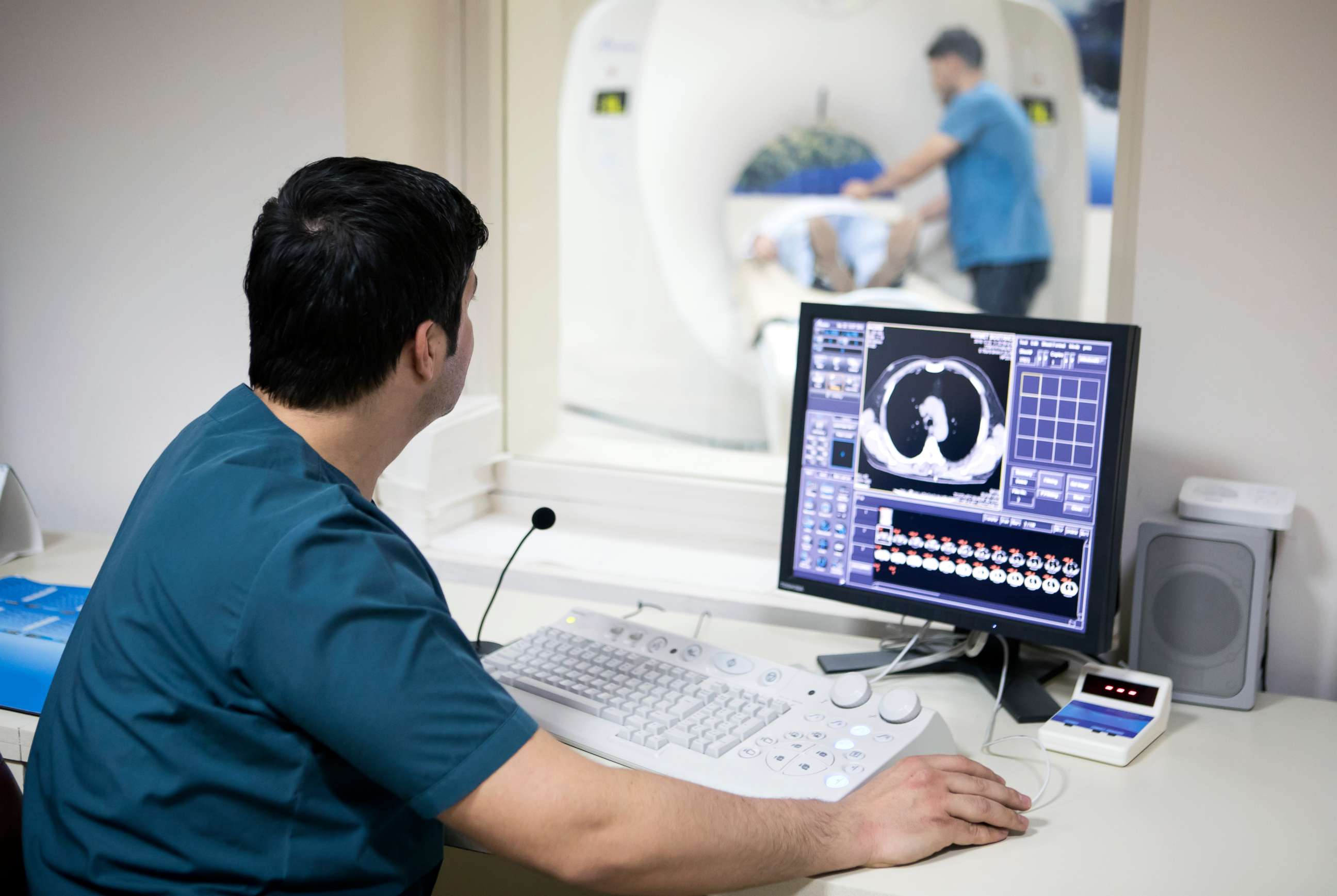 PHOTO: Radiologist reading a CAT scan.