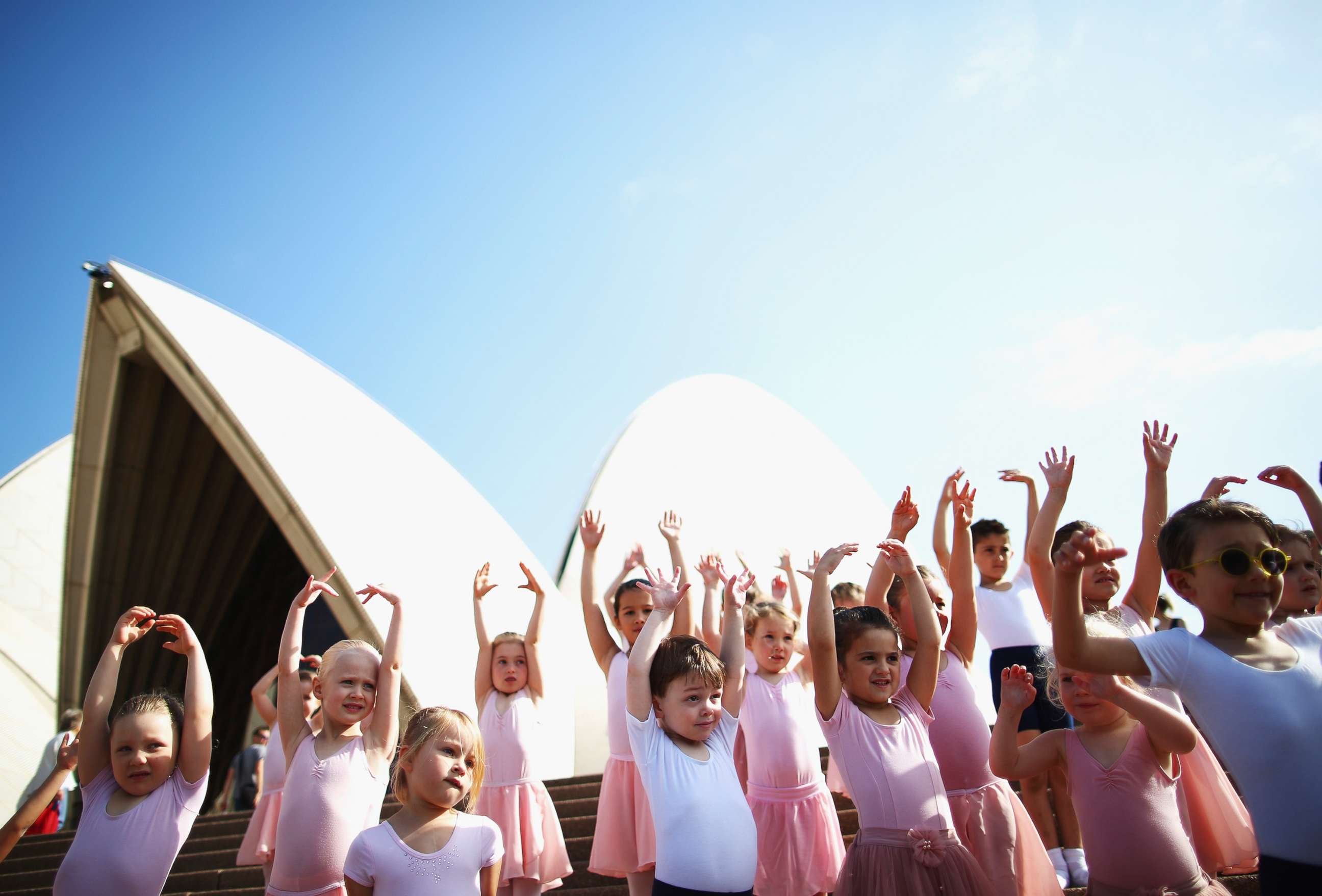 PHOTO: Young dancers perform during a outdoor ballet class on the steps of Sydney Opera House, on Oct. 9, 2015 in Sydney, Australia.