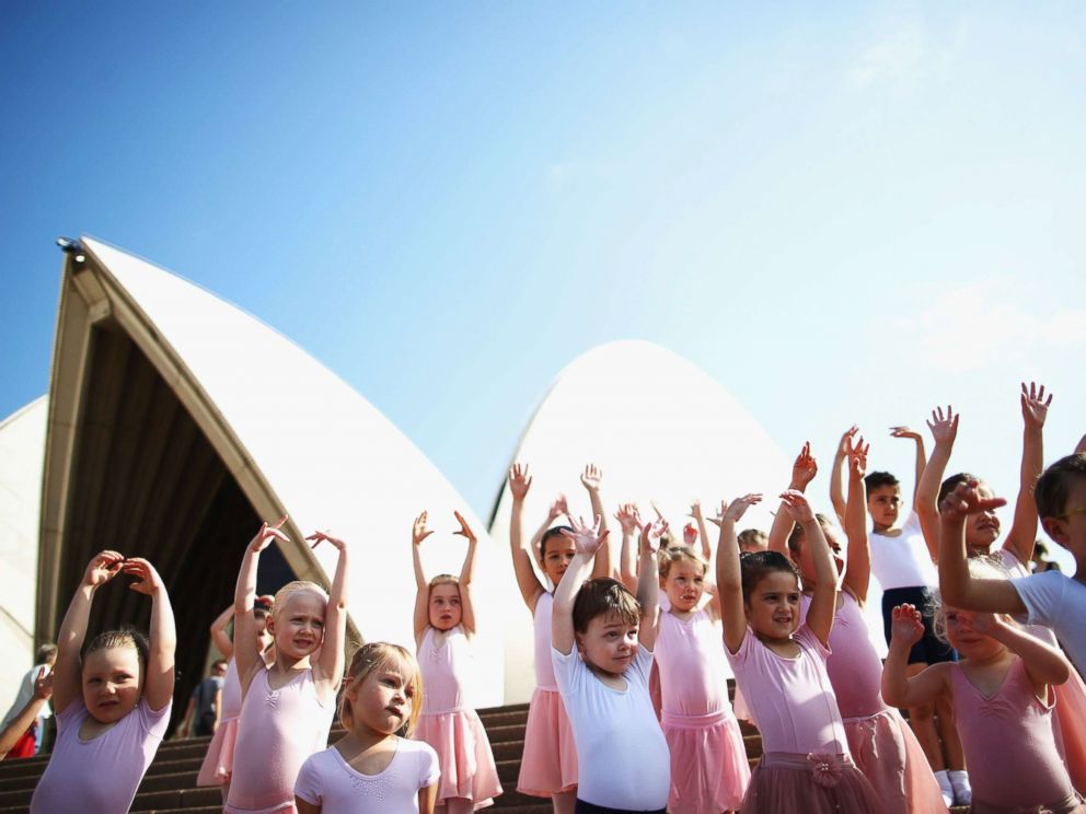 PHOTO: Young dancers perform during a outdoor ballet class on the steps of Sydney Opera House, on Oct. 9, 2015 in Sydney, Australia.