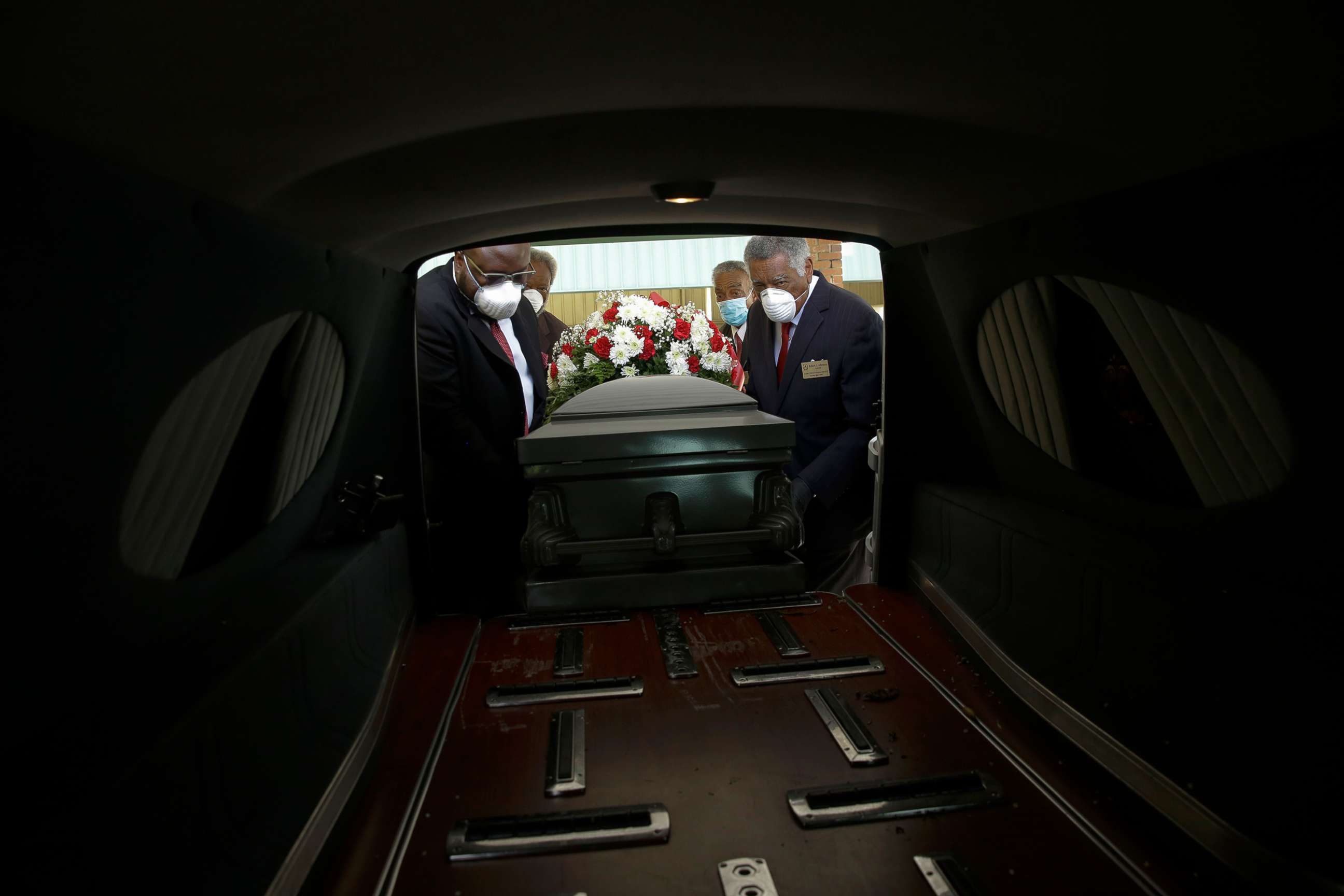 PHOTO: A casket is placed into a hearse, April 18, 2020, in Dawson, Ga., during the coronavirus pandemic.