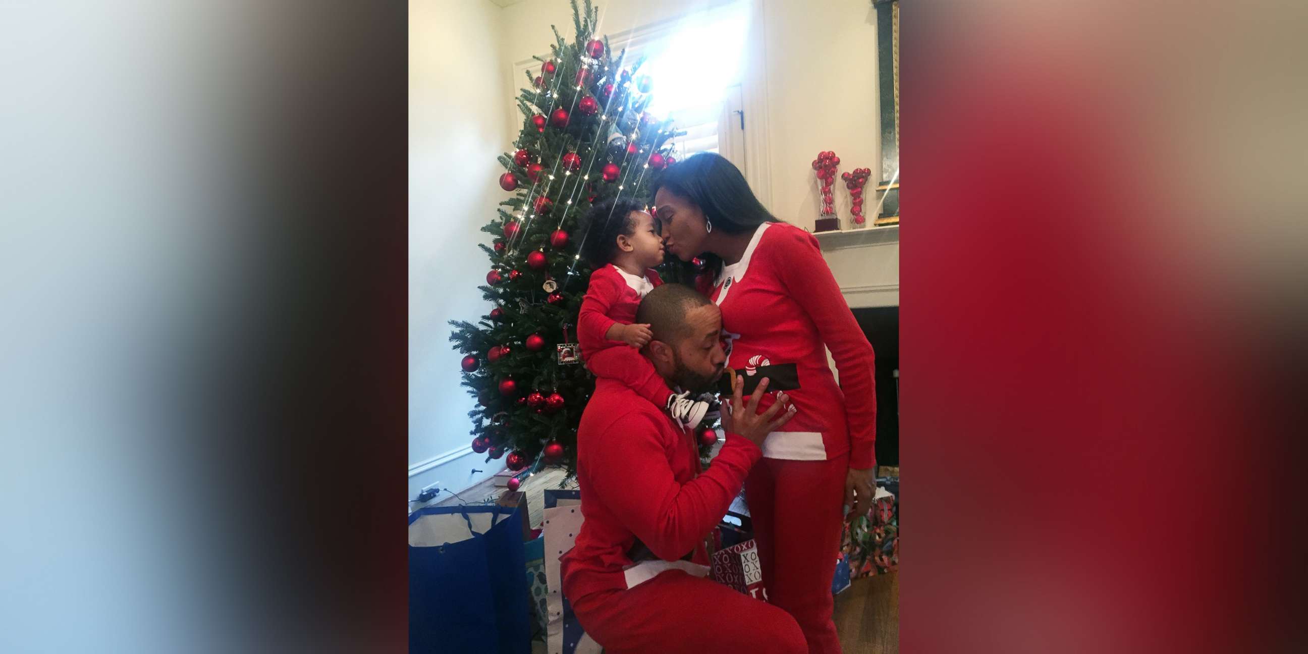 PHOTO: Kira and Charles Johnson pose for a photo with their son, Charles Johnson V, in their Los Angeles home on Christmas Day, 2015. Kira is pregnant with their second son, Langston. 