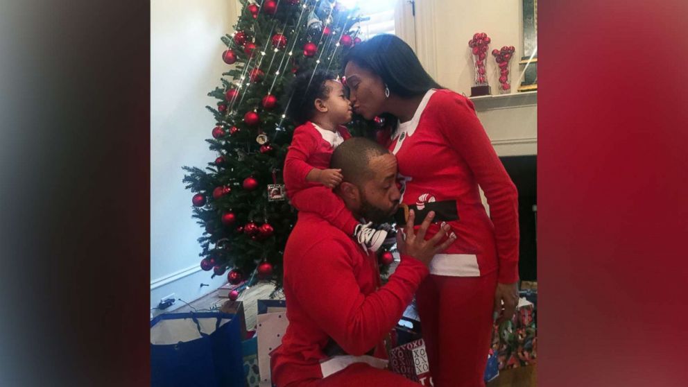 PHOTO: Kira and Charles Johnson pose for a photo with their son, Charles Johnson V, in their Los Angeles home on Christmas Day, 2015. Kira is pregnant with their second son, Langston. 