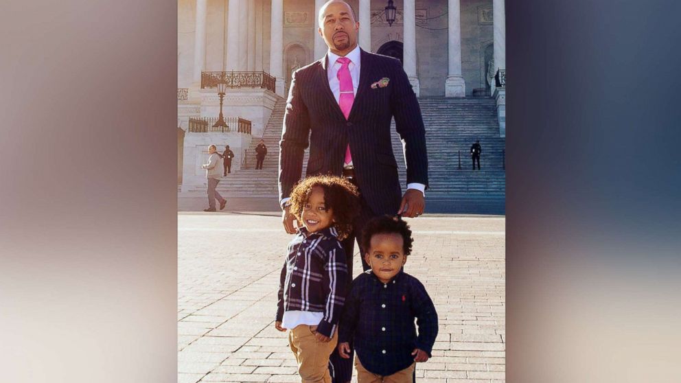 PHOTO: Charles Johnson poses for a photo with his sons Charles V and Langston Johnson in Washington, D.C. on Sept. 11, 2018, after the death of his wife Kira.