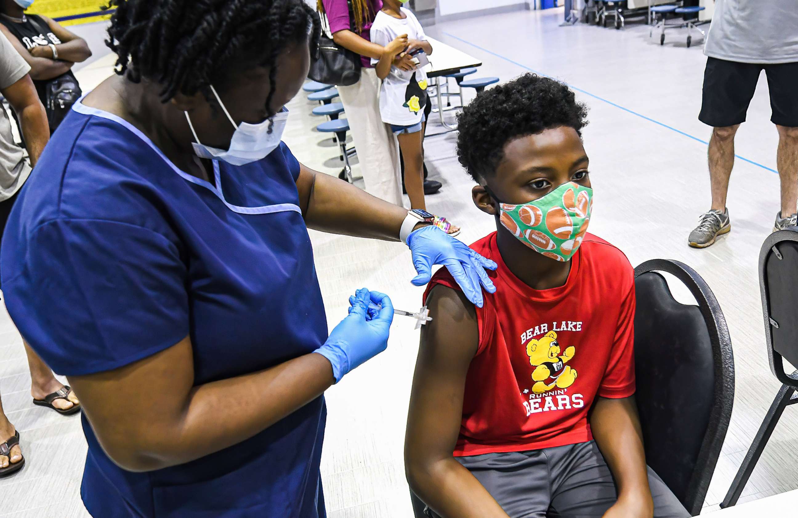 PHOTO: A nurse gives a boy a dose of the Pfizer vaccine at a vaccine clinic in Longwood, Fla., on Sept. 8, 2021, the day before classes begin for the 2021-22 school year.