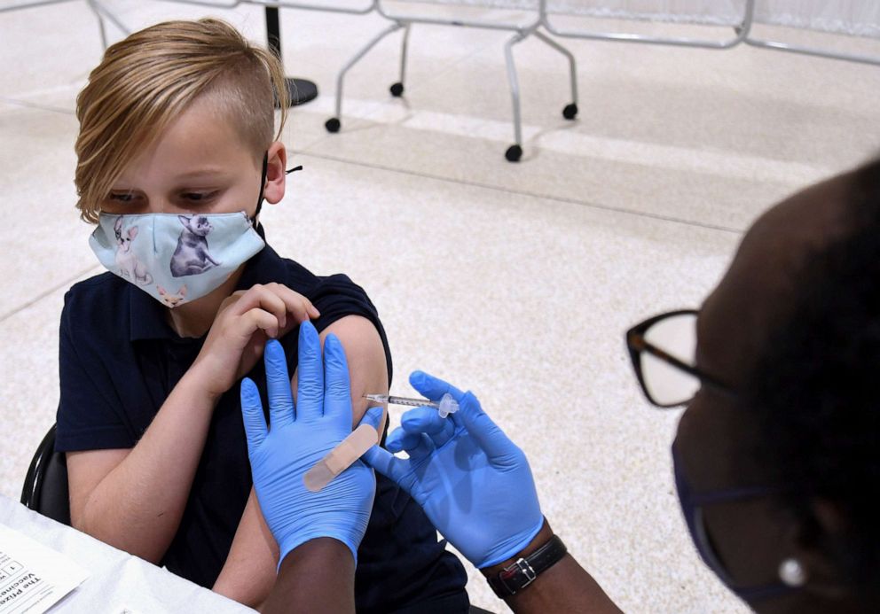 PHOTO: In this Nov. 2, 2021, file photo, a nurse gives a boy a shot of the Pfizer COVID-19 vaccine at a vaccination site for 5-11 year-olds at Eastmonte Park in Altamonte Springs, Fla.