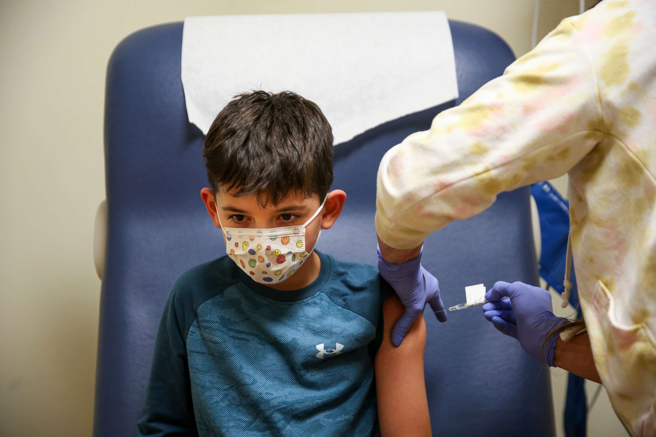PHOTO: A 9-year-old boy receives the Pfizer COVID-19 vaccine on Nov. 19, 2021, in Salem, Ore.