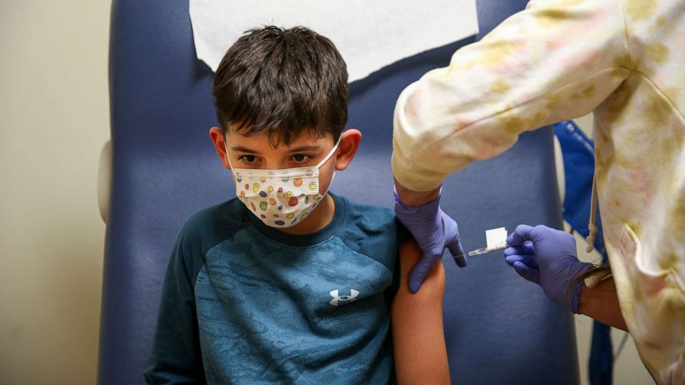 PHOTO: A 9-year-old boy receives the Pfizer COVID-19 vaccine on Nov. 19, 2021, in Salem, Ore.