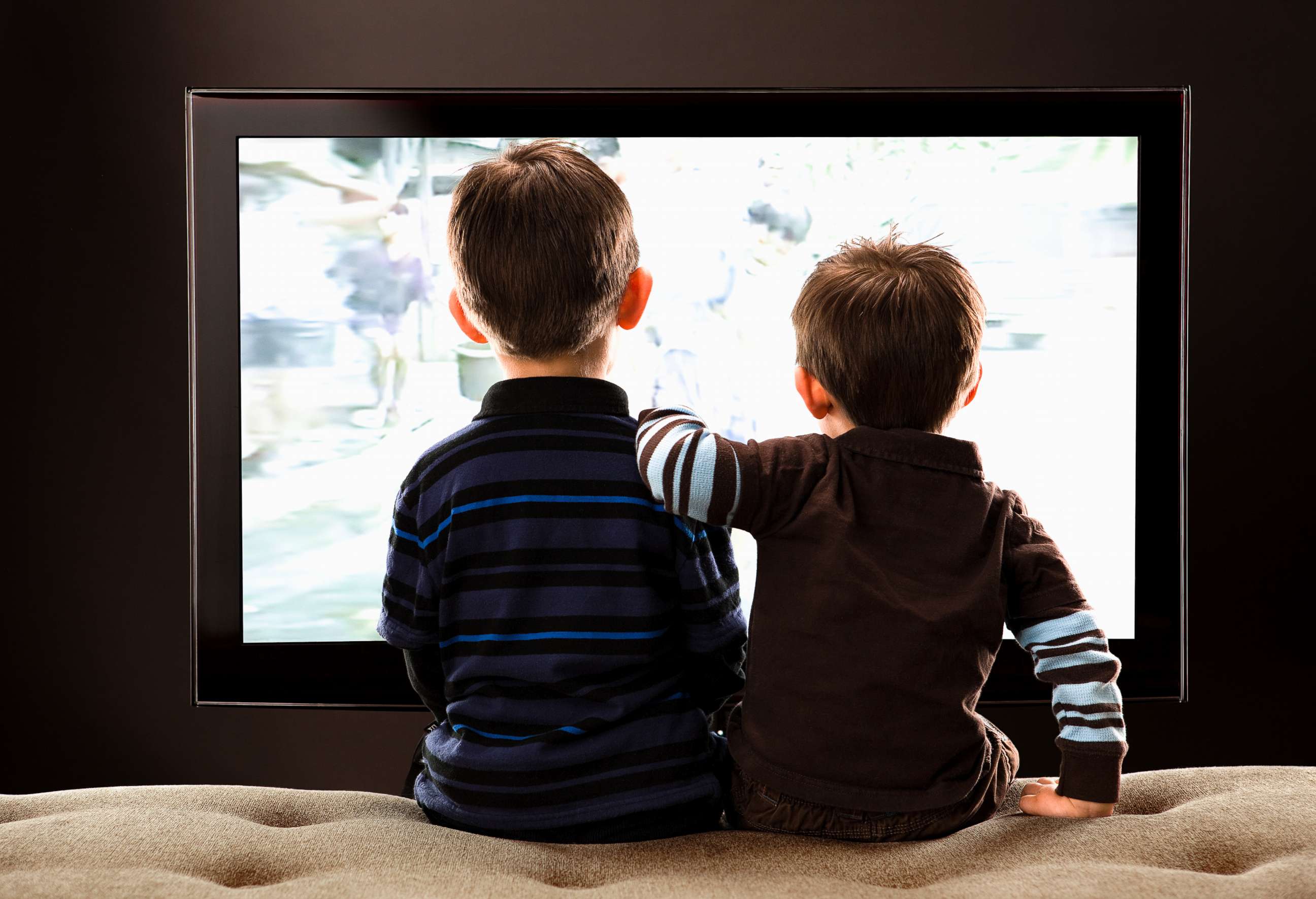 PHOTO: Two children watch television in this stock photo.