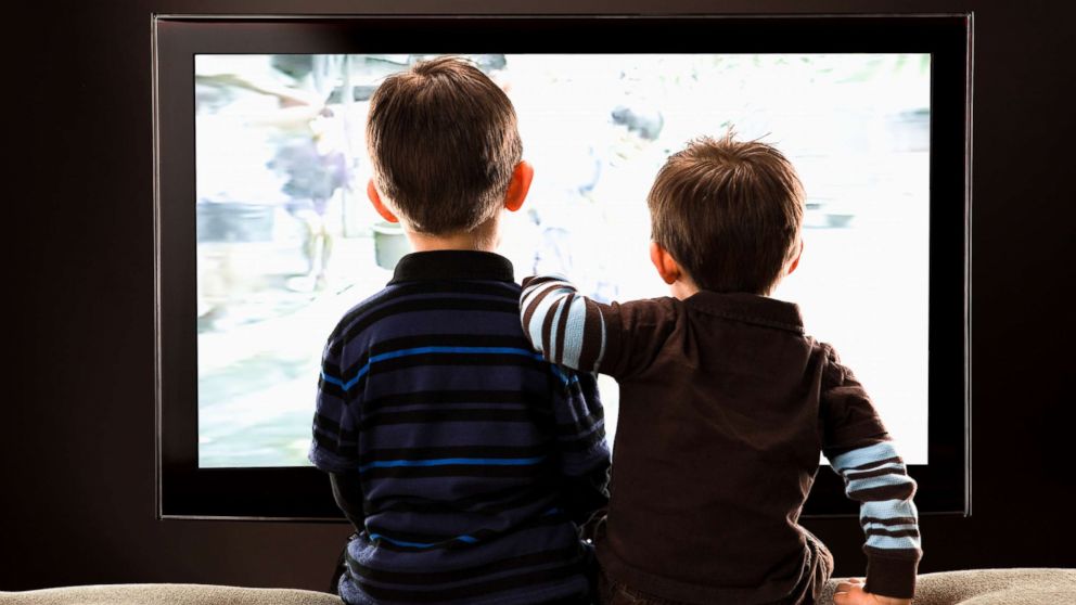 PHOTO: Two children watch television in this stock photo.