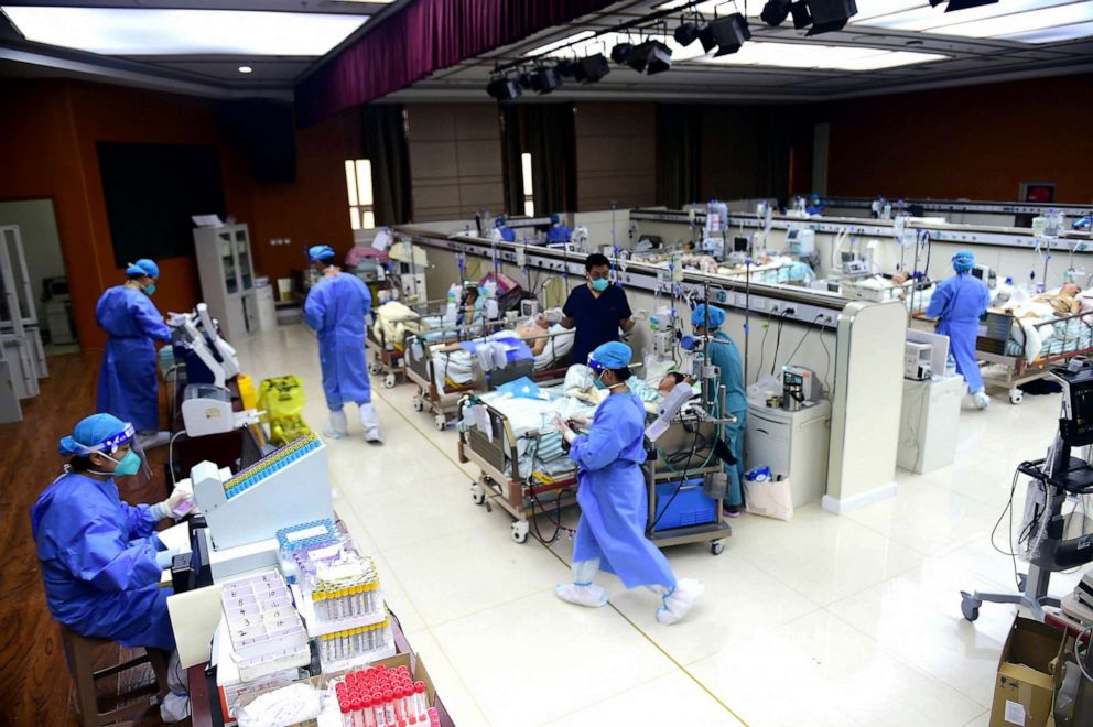 PHOTO: Medical workers attend to patients of the coronavirus disease (COVID-19) at an intensive care unit (ICU) converted from a conference room, at a hospital in Cangzhou, Hebei province, China, Jan. 11, 2023.