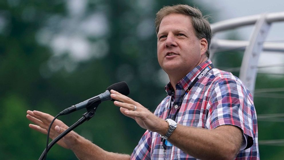 PHOTO: In this July 18, 2021, file photo, New Hampshire Governor Chris Sununu speaks at an auto race in Loudon, N.H.