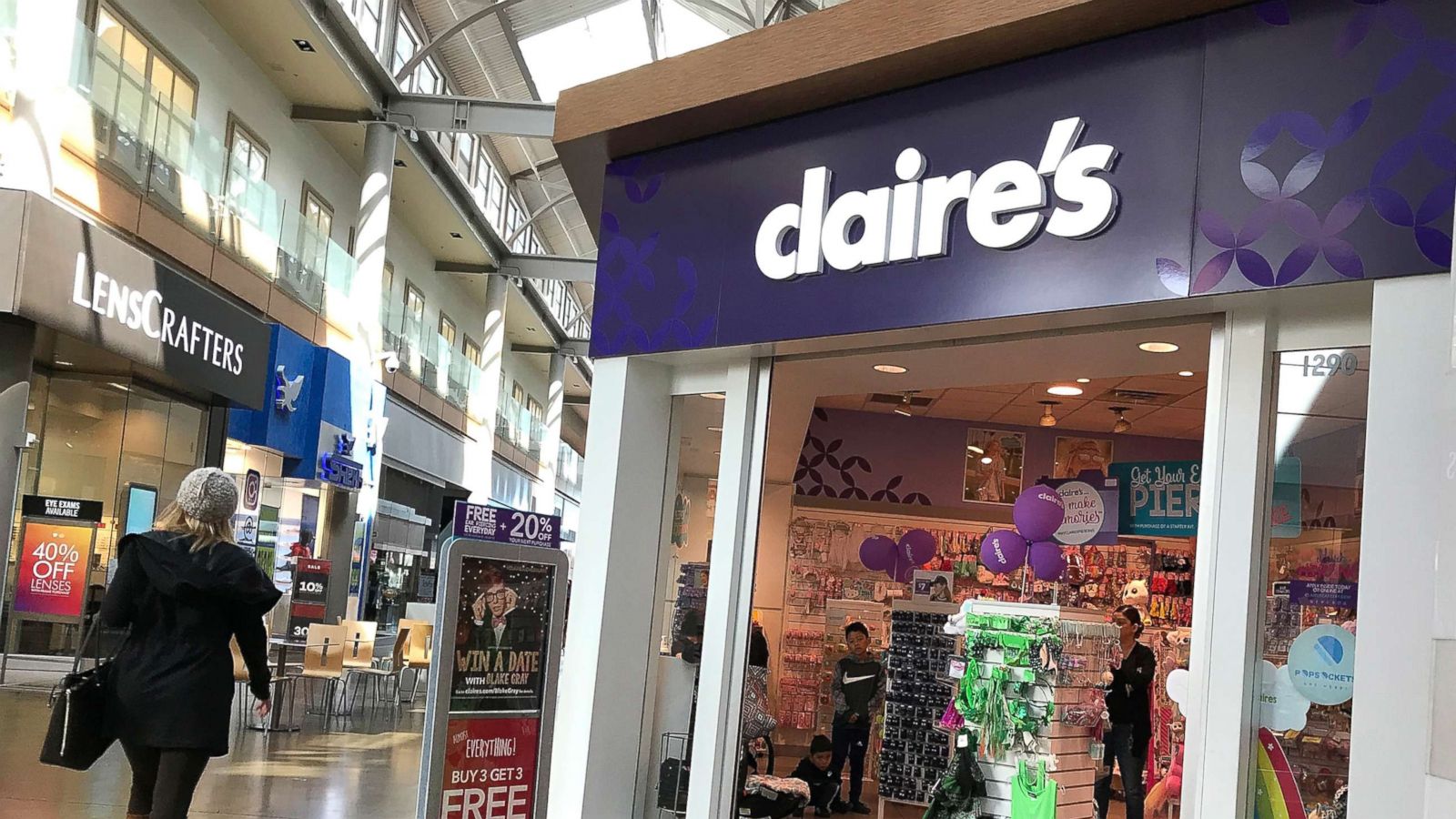 PHOTO: A woman walks by a Claire's store at the Northgate Mall, March 19, 2018, in San Rafael, Calif.