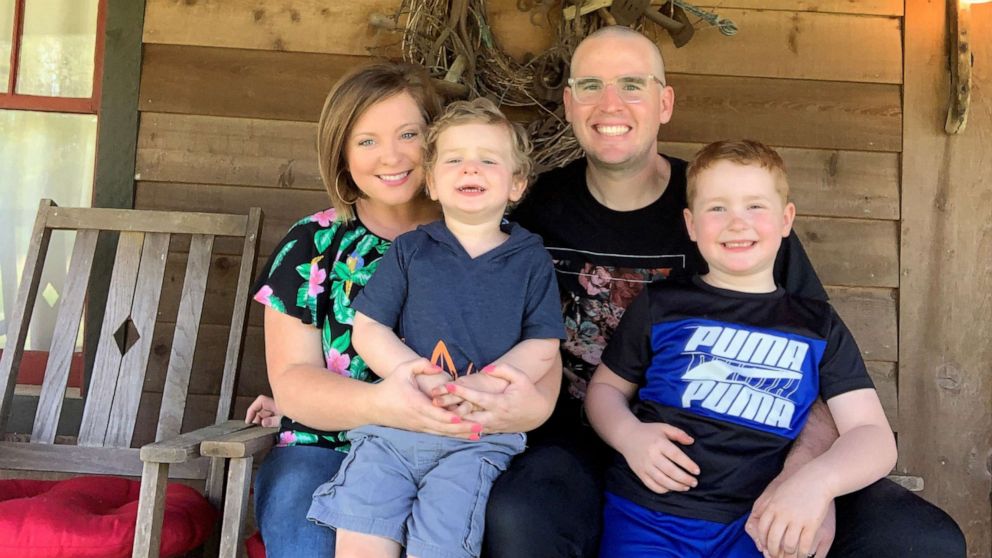PHOTO: Noah and Ivy Cleveland pose with their two sons, Zeek and Samuel, at their home in McDonough, Georgia in April 2019. 