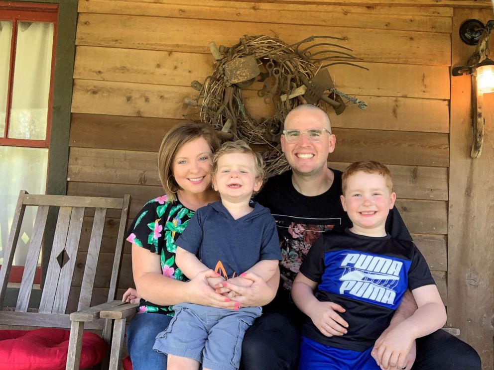 PHOTO: Noah and Ivy Cleveland pose with their two sons, Zeek and Samuel, at their home in McDonough, Georgia in April 2019. 