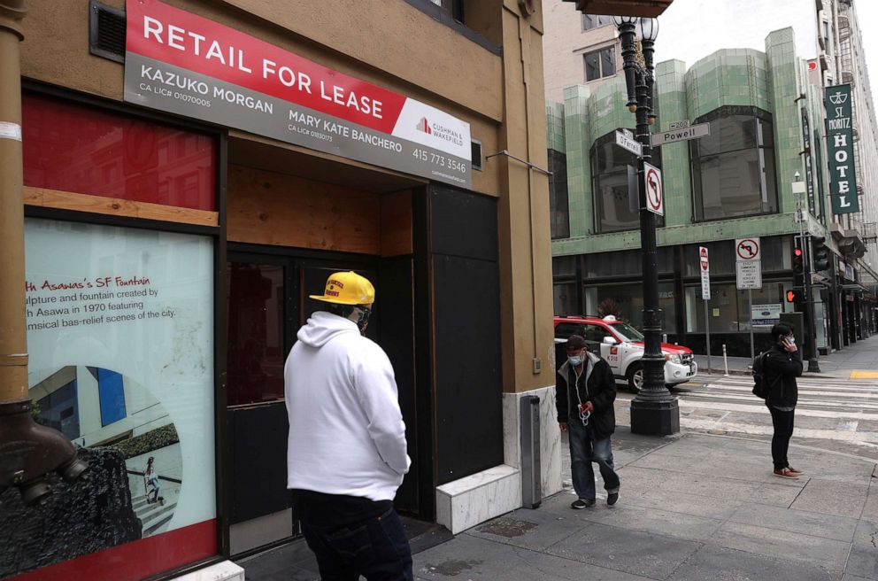 PHOTO: Pedestrians walk by retail spaces for lease on September 03, 2020, in San Francisco, Calif.