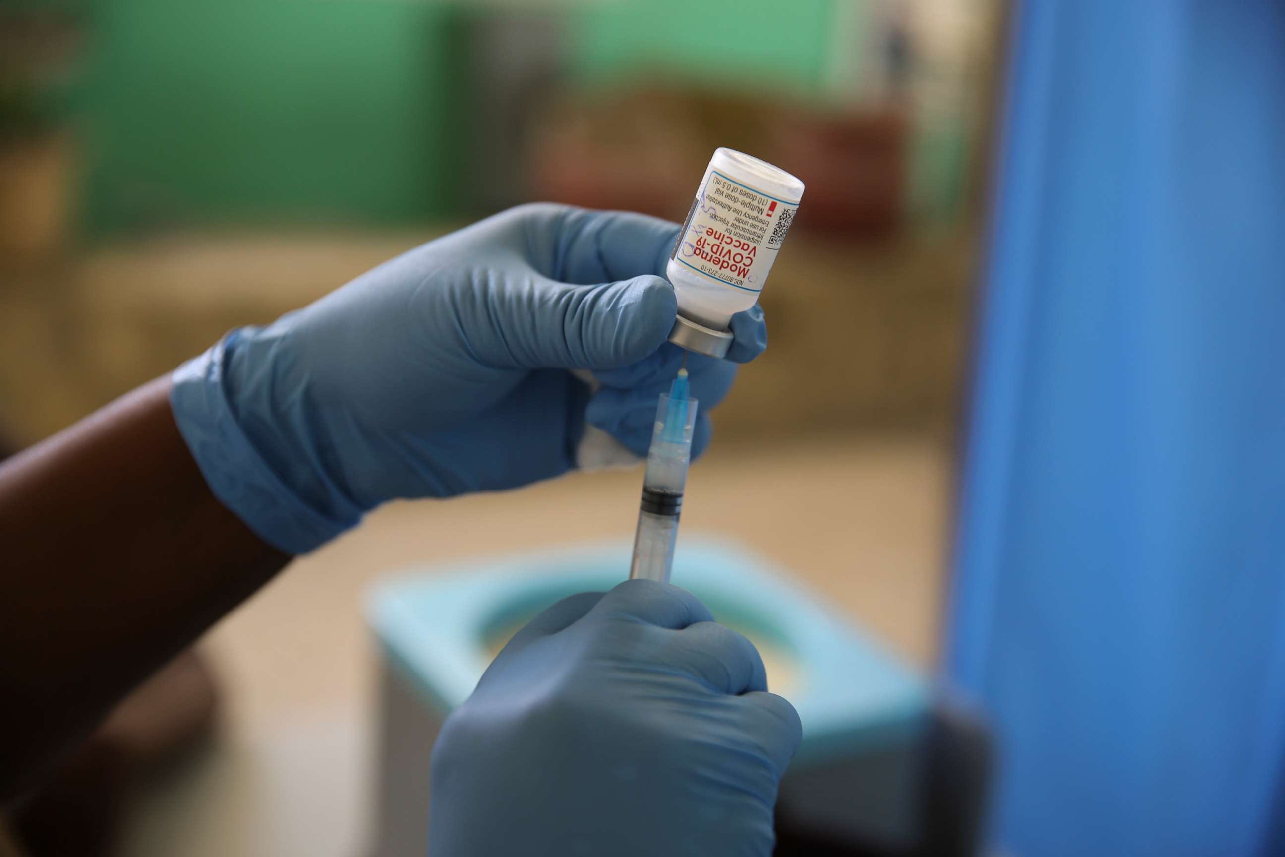 PHOTO: FILE - A medical worker prepares a shot of the Moderna vaccine during a vaccination campaign at Saint Damien Hospital in Port-au-Prince, Haiti, Tuesday, July 27, 2021. Haiti's health minister said Tuesday, Jan. 25, 2022.