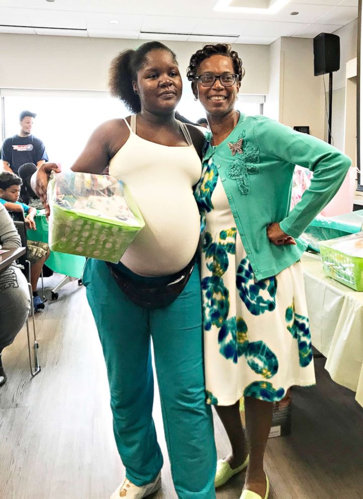 PHOTO: Evelyn Jones poses with an expectant mom at a baby shower at St. Bernard Hospital in Chicago.