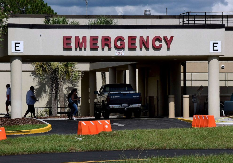 PHOTO: People are seen outside the entrance to the emergency room at Oak Hill Hospital in Hernando County, Fla., July 26, 2020.