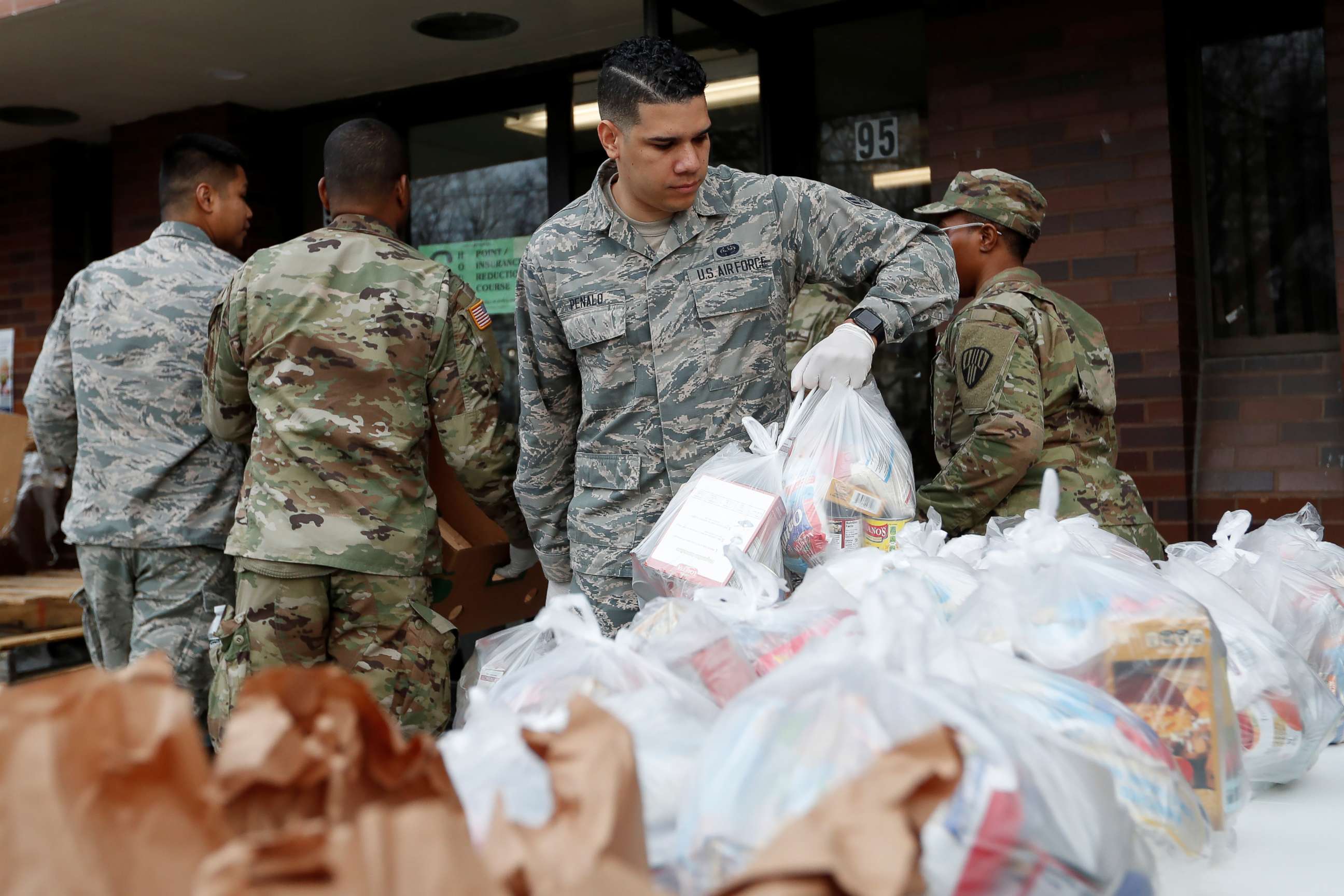 PHOTO: National Guard troops set up food donations in New Rochelle, New York, U.S., March 12, 2020.