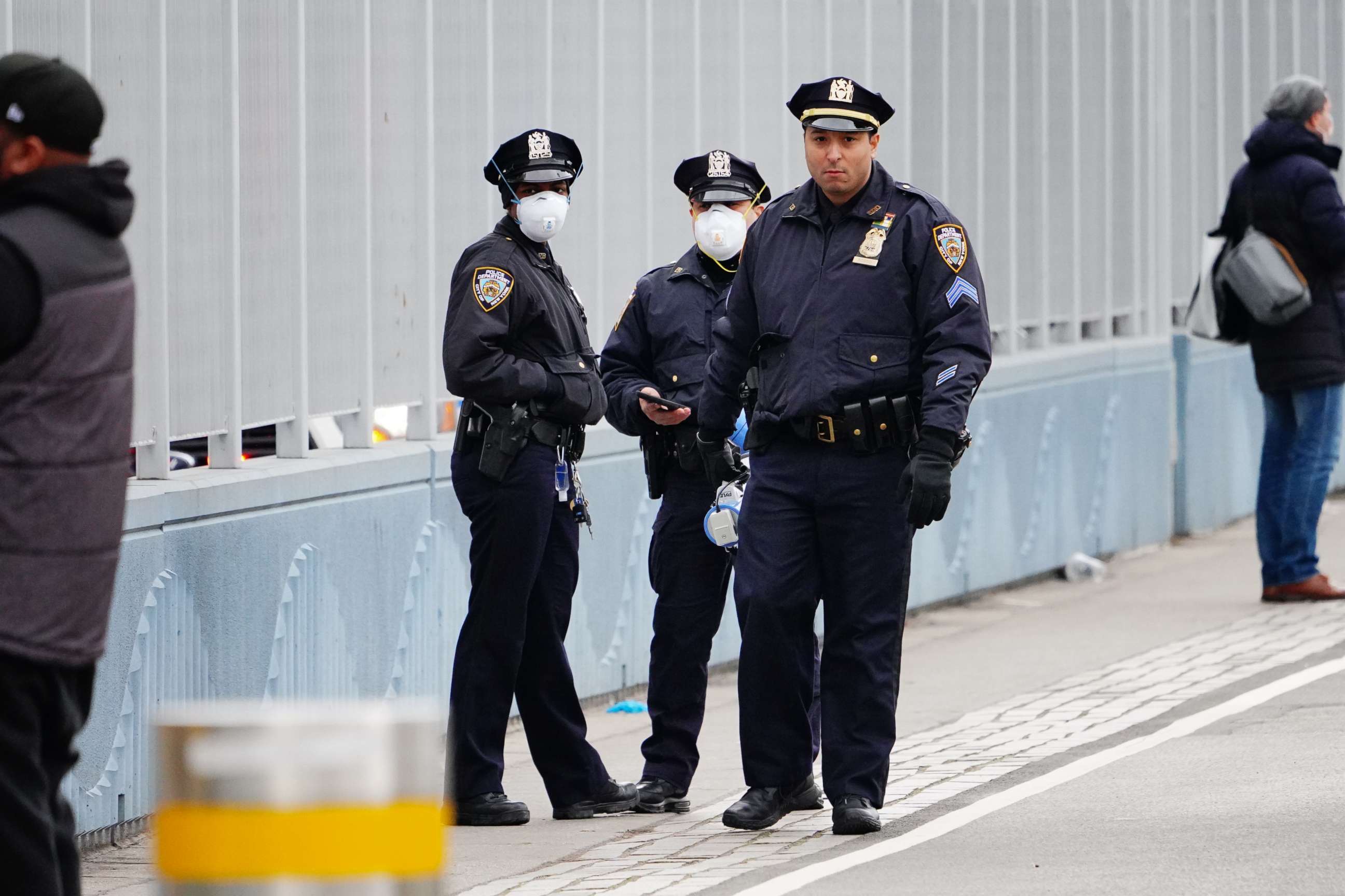 PHOTO: NYPD officers prepare to disperse people who gathered to check out the USNS Comfort on March 31, 2020, in New York.