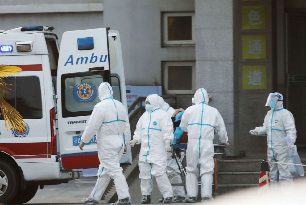 PHOTO: Medical staff transfer patients to Jinyintan hospital where patients infected with a new strain of Coronavirus identified as the cause of the Wuhan pneumonia outbreak are treated in Wuhan, Hubei province, China, Jan. 20, 2020.