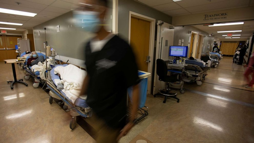 PHOTO: Patients are held in the hallway as St. Mary Medical Center resorts to using tents outside to handle the overflow at its 200 bed hospital during the outbreak of the coronavirus disease in Apple Valley, Calif., Jan. 12, 2021.